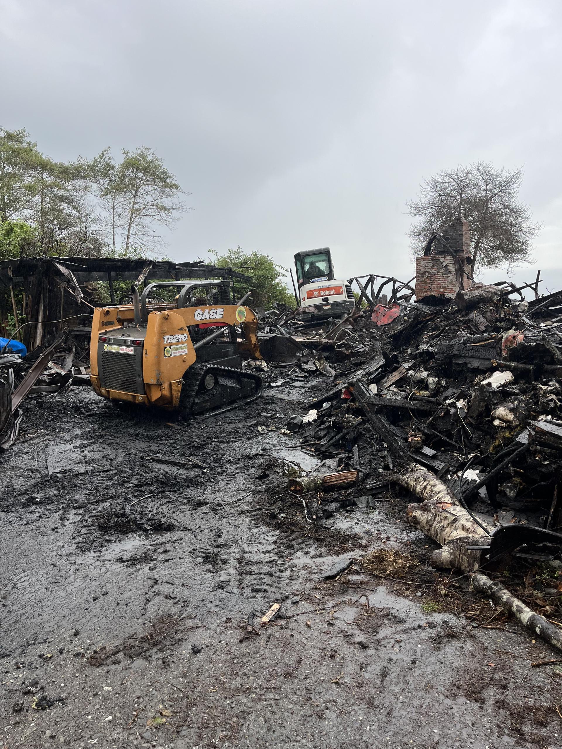 Demolition debris staged for haul away