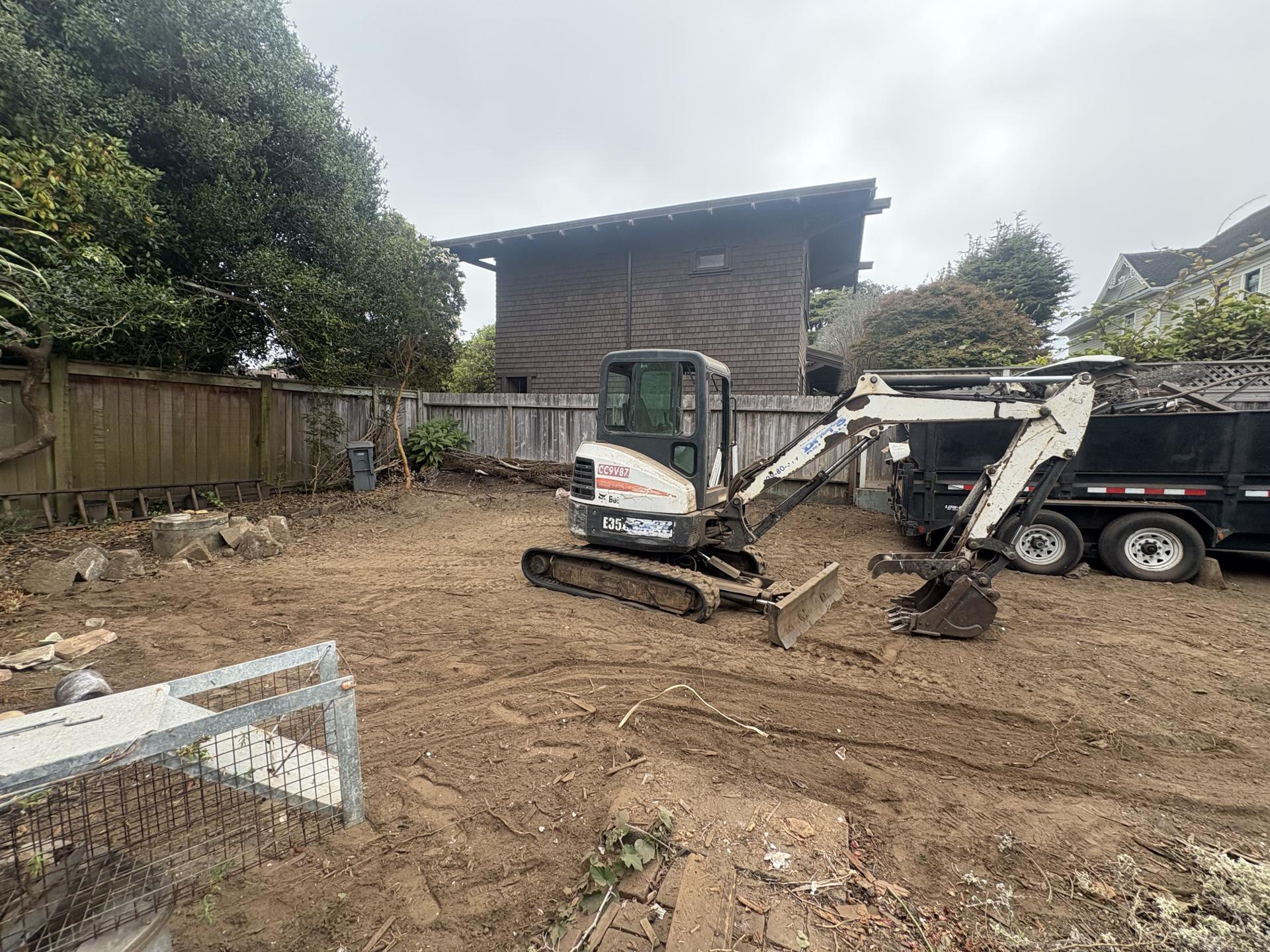 Crew preparing an RV for demolition