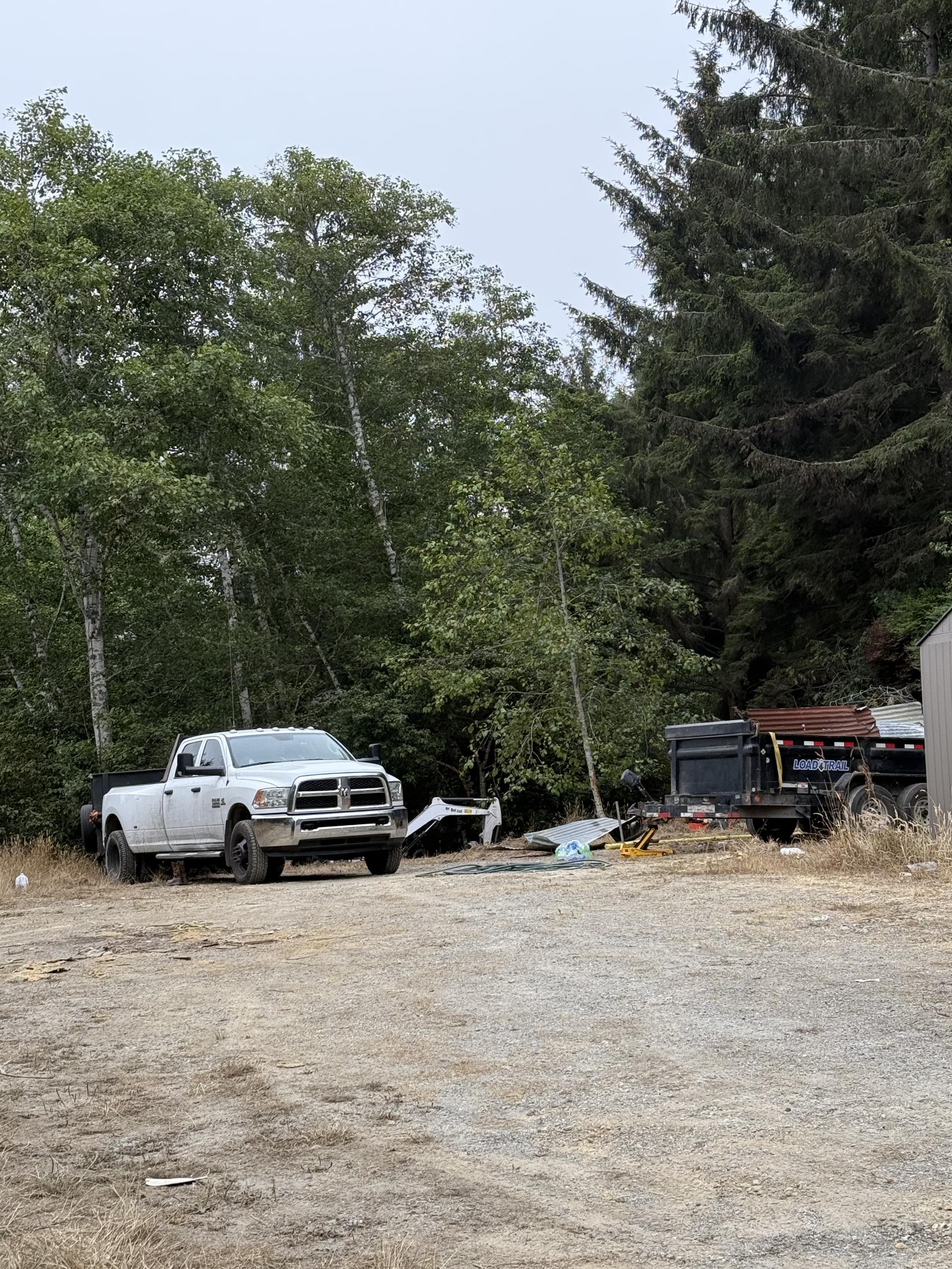 Shed demolition debris loaded for haul away