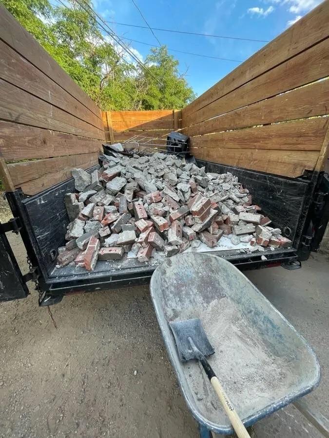 Bathroom tear out debris staged for haul away
